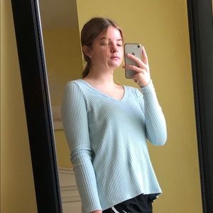 light blue sweater